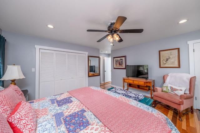 11198 E Royal Rd, Canadian Lakes, MI 49346 - bedroom with wood finished floors, a closet, recessed lighting, and ceiling fan