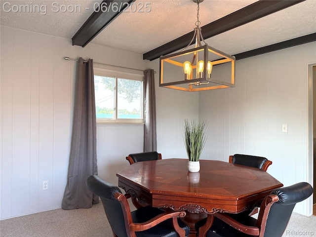 32851 Dover Ave, Warren, MI 48088 - dining room with beam ceiling, a textured ceiling, carpet flooring, a chandelier, and wood walls