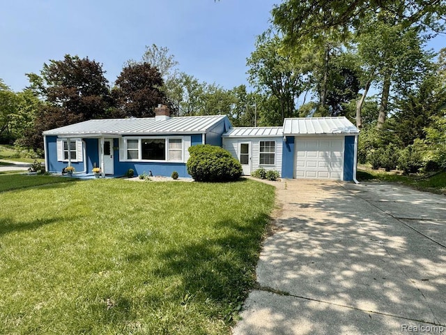 612 Cressfield Ln, Ann Arbor, MI 48103 - ranch-style house with a standing seam roof, a garage, a chimney, metal roof, and a front lawn