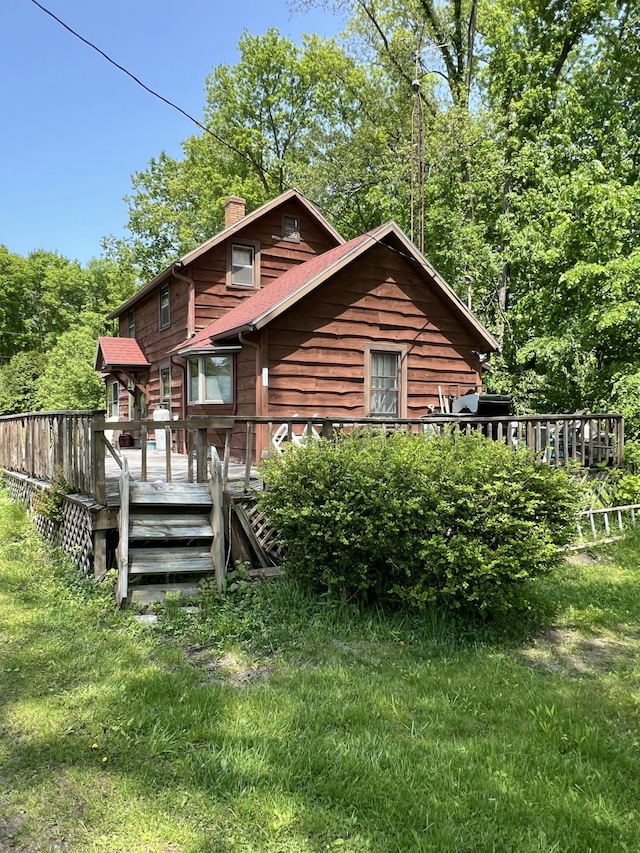 7530 Warren Woods Rd, Three Oaks, MI 49128 - back of property featuring a chimney and a deck