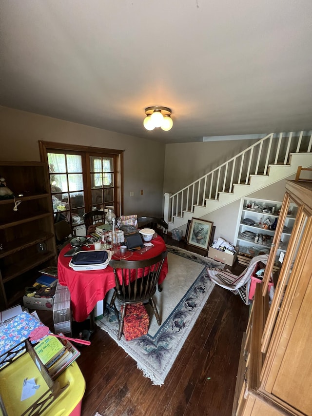 7530 Warren Woods Rd, Three Oaks, MI 49128 - dining room featuring stairs and hardwood / wood-style flooring