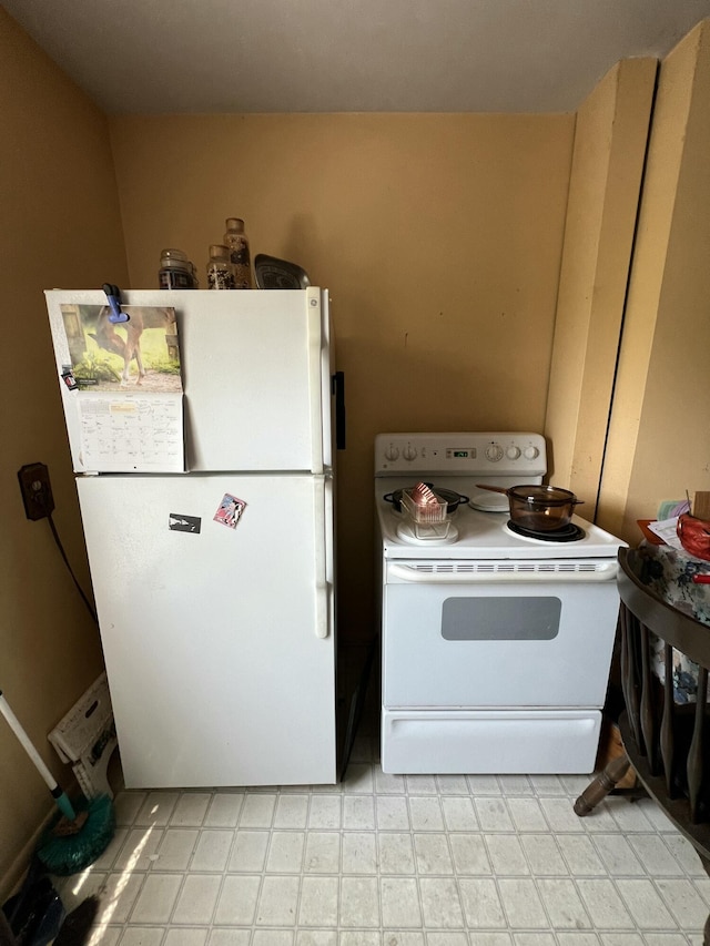 7530 Warren Woods Rd, Three Oaks, MI 49128 - kitchen with white appliances and light flooring