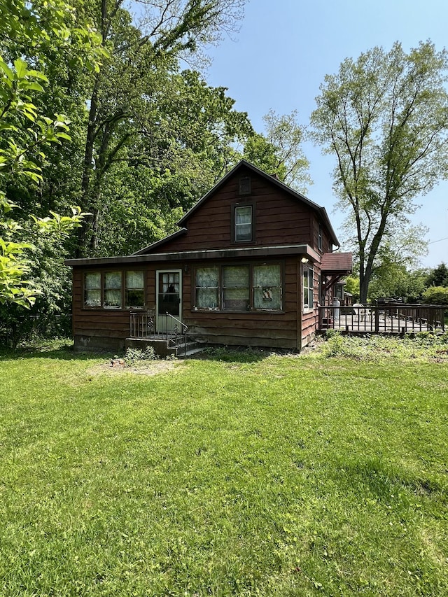 7530 Warren Woods Rd, Three Oaks, MI 49128 - rear view of house with a yard