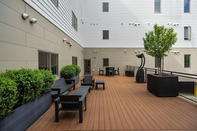 410 N First St Unit 207, Ann Arbor, MI 48103 - wooden deck with an outdoor hangout area