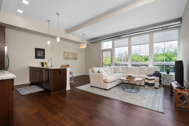 410 N First St Unit 207, Ann Arbor, MI 48103 - living area with baseboards, dark wood-style floors, recessed lighting, and beam ceiling