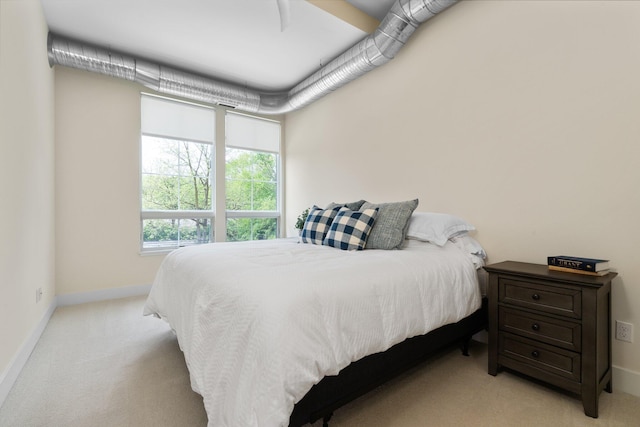 410 N First St Unit 207, Ann Arbor, MI 48103 - bedroom with light carpet and baseboards