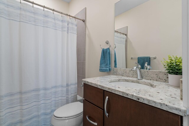 410 N First St Unit 207, Ann Arbor, MI 48103 - full bath with vanity, toilet, and shower / bath combination with curtain
