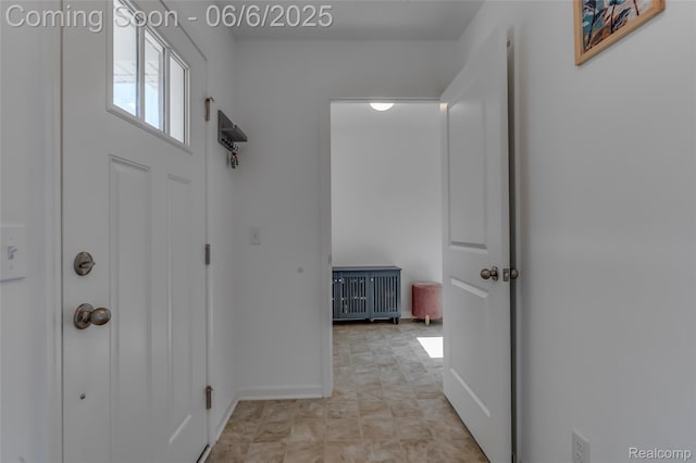 137 Monument Ln, Wixom, MI 48393 - corridor with radiator and baseboards