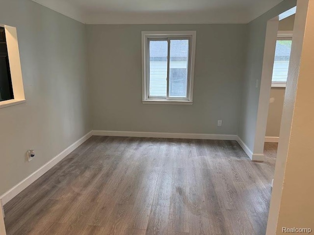 20760 Ridgedale St, Oak Park, MI 48237 - empty room featuring wood finished floors and baseboards