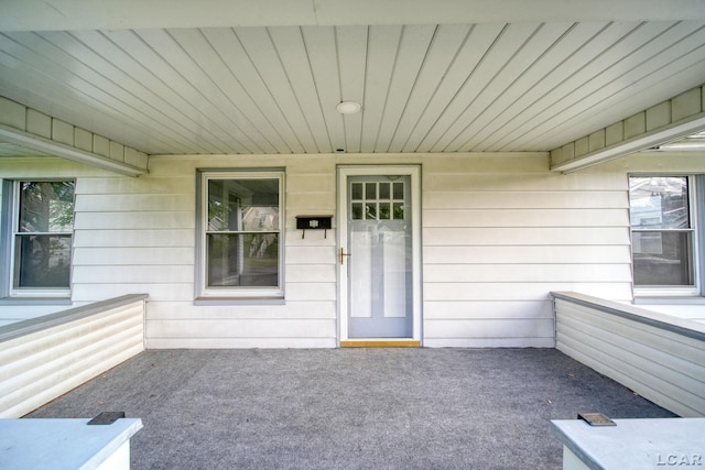 174 W Mansion St, Jackson, MI 49203 - view of exterior entry featuring a patio area