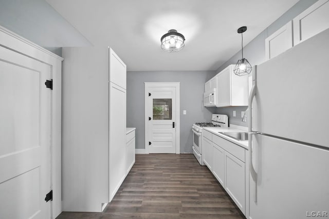 174 W Mansion St, Jackson, MI 49203 - kitchen featuring white appliances, white cabinets, and light countertops