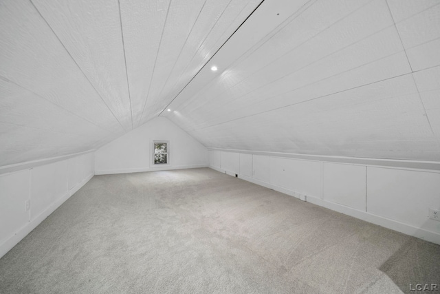 174 W Mansion St, Jackson, MI 49203 - bonus room with vaulted ceiling and carpet flooring