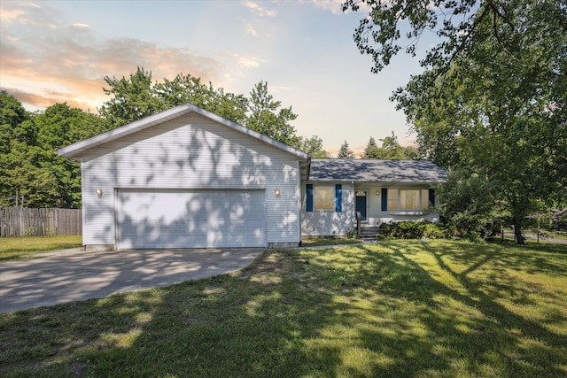502 Woodland Dr, Buchanan, MI 49107 - single story home featuring driveway, an attached garage, and a porch