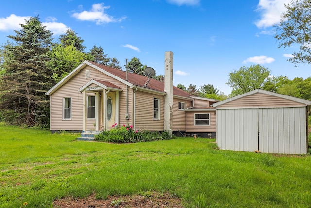 238 Long Ave, Michigan Center, MI 49254 - view of front of home featuring a front yard
