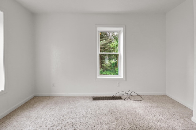238 Long Ave, Michigan Center, MI 49254 - carpeted spare room featuring baseboards