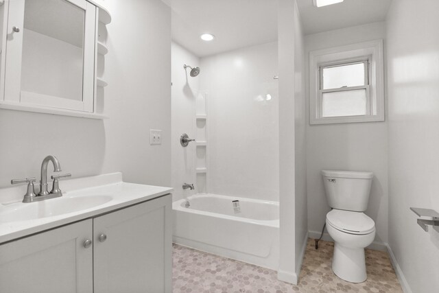 238 Long Ave, Michigan Center, MI 49254 - full bath with toilet, vanity, washtub / shower combination, and baseboards