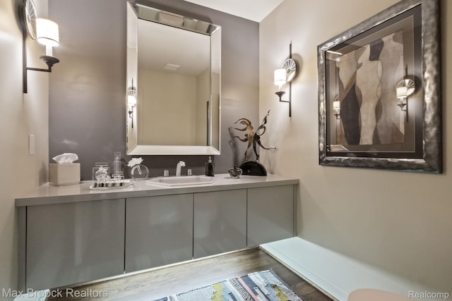 6566 Bristol Dr, West Bloomfield, MI 48322 - bathroom featuring vanity and wood finished floors