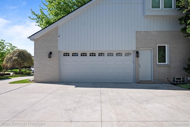 6566 Bristol Dr, West Bloomfield, MI 48322 - garage featuring driveway