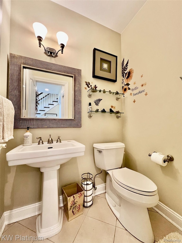 3105 E Woodland Dr, Port Huron, MI 48060 - half bathroom with toilet and tile patterned flooring