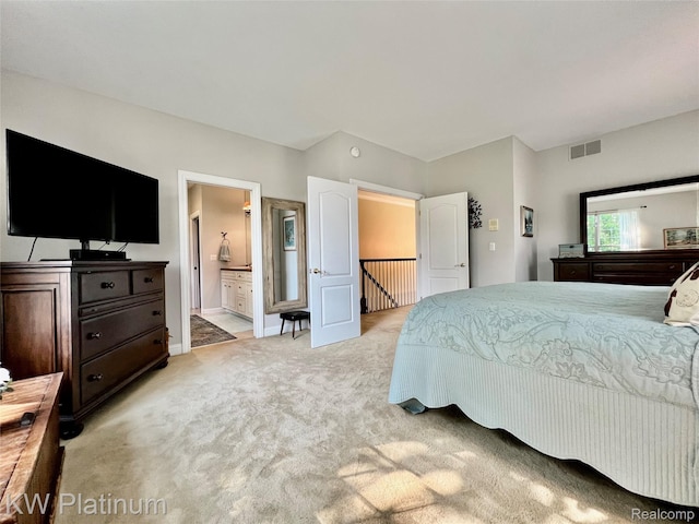 3105 E Woodland Dr, Port Huron, MI 48060 - bedroom featuring light colored carpet and ensuite bathroom