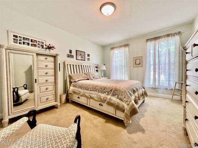 3105 E Woodland Dr, Port Huron, MI 48060 - bedroom featuring light colored carpet and baseboards