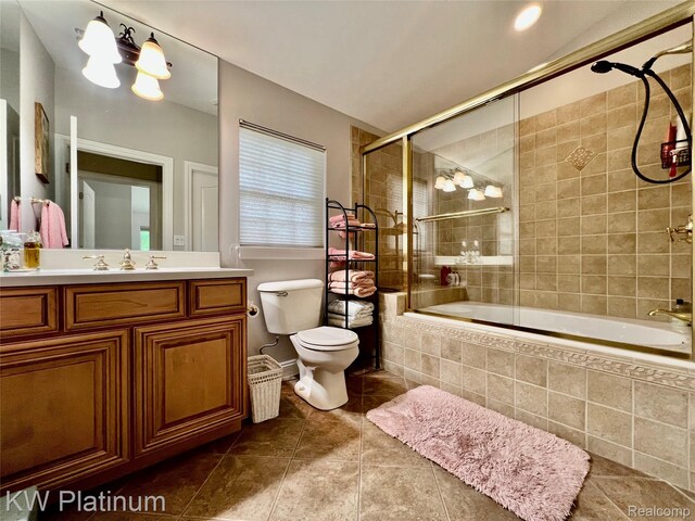 3105 E Woodland Dr, Port Huron, MI 48060 - full bathroom with tiled shower / bath combo, tile patterned flooring, and vanity