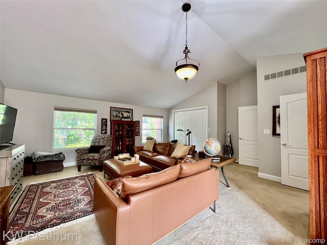 3105 E Woodland Dr, Port Huron, MI 48060 - living room featuring light colored carpet and lofted ceiling