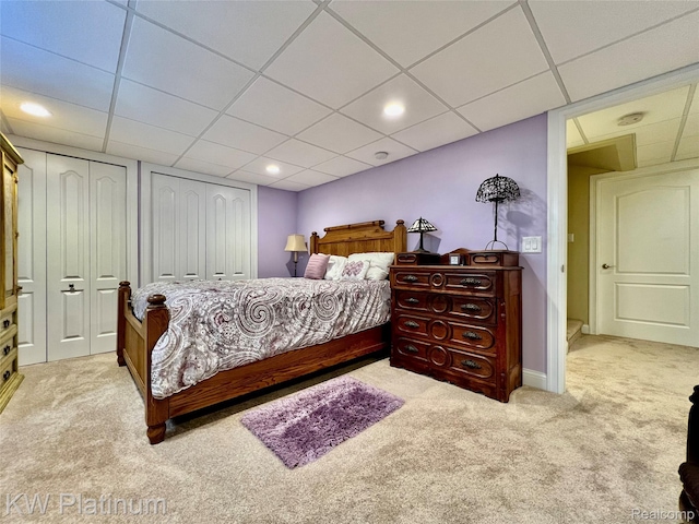 3105 E Woodland Dr, Port Huron, MI 48060 - carpeted bedroom with a paneled ceiling and multiple closets