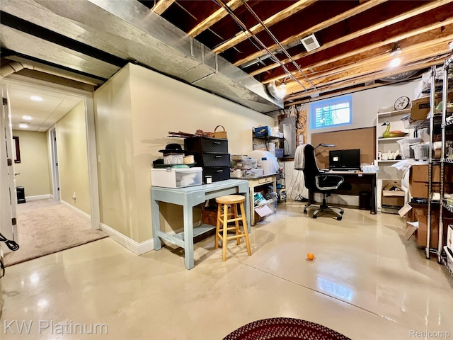 3105 E Woodland Dr, Port Huron, MI 48060 - below grade area featuring a desk and baseboards