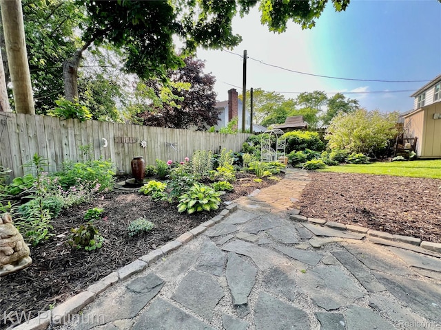 3105 E Woodland Dr, Port Huron, MI 48060 - view of yard featuring a patio