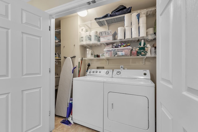 3366 Endsleigh Ln, Ypsilanti, MI 48197 - laundry room featuring washer and clothes dryer and light tile patterned floors
