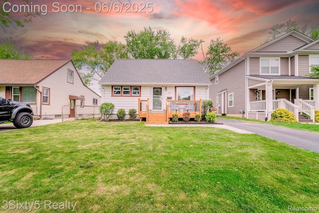3831 Durham Rd, Royal Oak, MI 48073 - view of front of house featuring a yard and a wooden deck