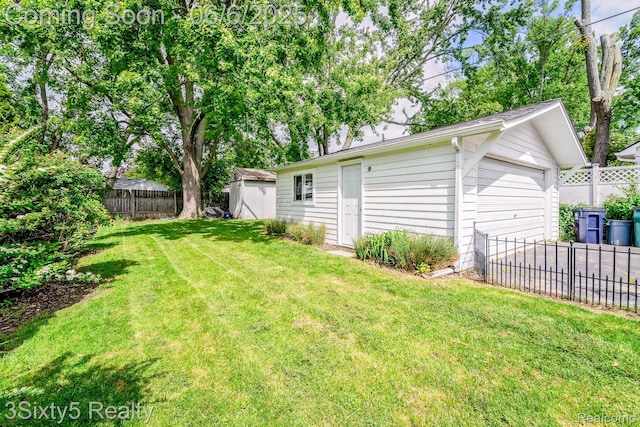 3831 Durham Rd, Royal Oak, MI 48073 - view of yard featuring an outdoor structure and a garage