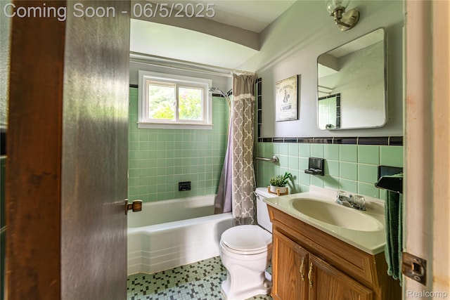 7620 Polk St, Southgate, MI 48180 - bathroom featuring toilet, shower / tub combo with curtain, vanity, and tile walls