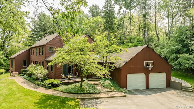 2694 Wayside Dr, Ann Arbor, MI 48103 - view of front of house with driveway and a garage