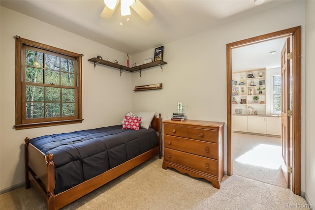 2694 Wayside Dr, Ann Arbor, MI 48103 - bedroom featuring light colored carpet and a ceiling fan
