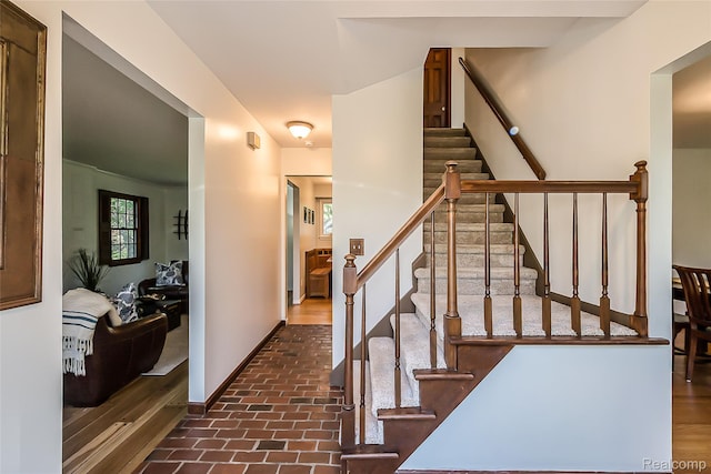 2694 Wayside Dr, Ann Arbor, MI 48103 - stairway with brick floors and baseboards