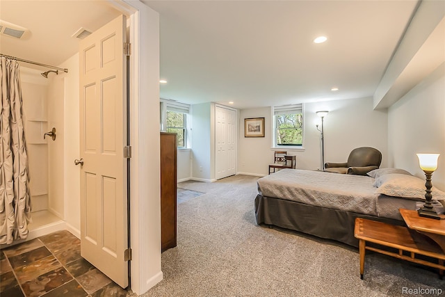 2694 Wayside Dr, Ann Arbor, MI 48103 - bedroom with recessed lighting, dark carpet, baseboards, and a closet