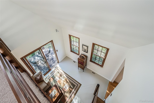 2694 Wayside Dr, Ann Arbor, MI 48103 - living room featuring baseboards and high vaulted ceiling