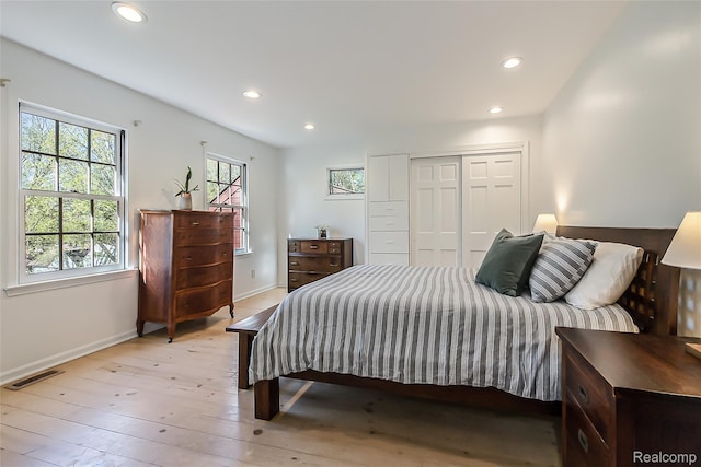 2694 Wayside Dr, Ann Arbor, MI 48103 - bedroom featuring baseboards, recessed lighting, light wood finished floors, and a closet