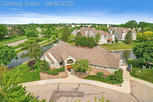 1637 Coburn Dr, Ann Arbor, MI 48108 - aerial perspective of suburban area with a nearby body of water