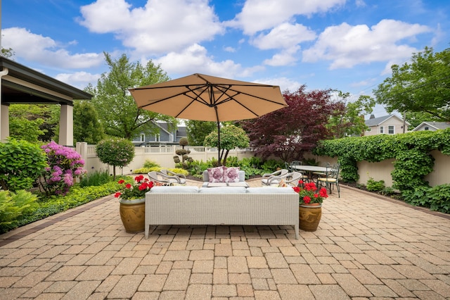 903 Lake Blvd, Saint Joseph, MI 49085 - fenced backyard with a patio area and an outdoor hangout area
