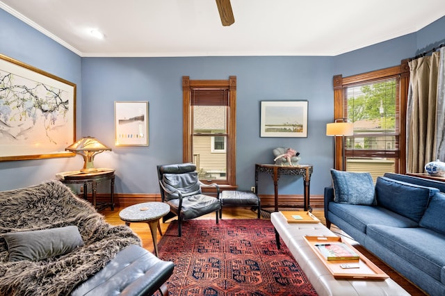 903 Lake Blvd, Saint Joseph, MI 49085 - living room featuring wood finished floors, baseboards, ceiling fan, and ornamental molding