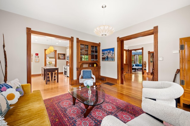 903 Lake Blvd, Saint Joseph, MI 49085 - living area featuring light wood-type flooring and baseboards