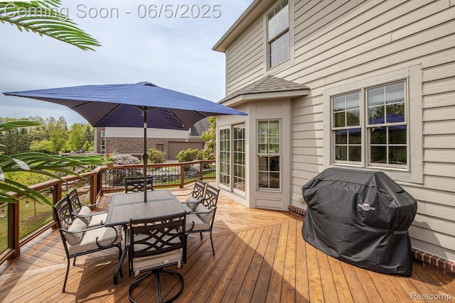 8922 Stonewall W, Clarkston, MI 48348 - wooden terrace with outdoor dining area and a grill