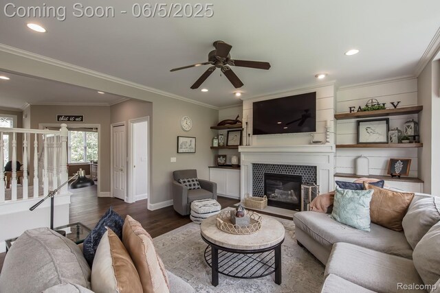8922 Stonewall W, Clarkston, MI 48348 - living room with a ceiling fan, recessed lighting, a fireplace, dark wood-style flooring, and baseboards
