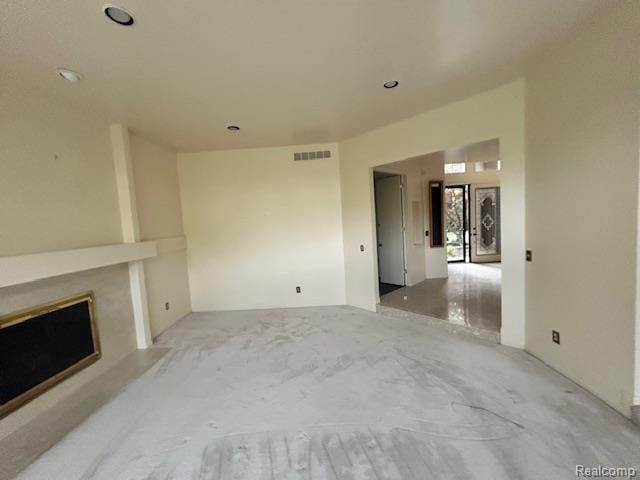 6880 Burtonwood Dr, West Bloomfield, MI 48322 - unfurnished living room with a premium fireplace and recessed lighting