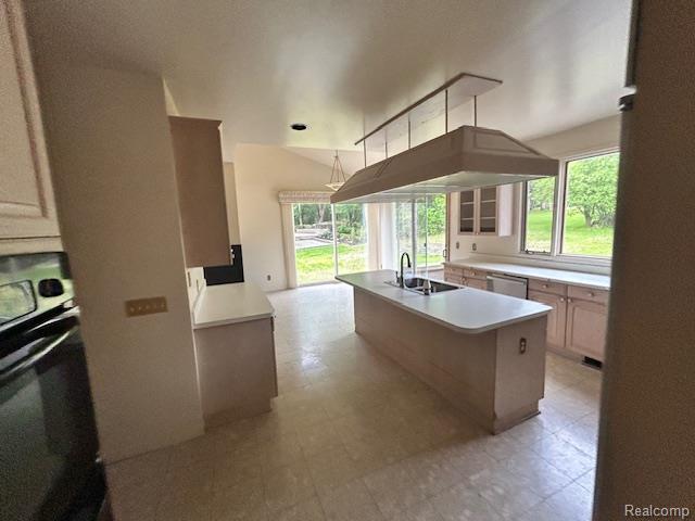 6880 Burtonwood Dr, West Bloomfield, MI 48322 - kitchen featuring wall oven, dishwasher, healthy amount of natural light, and a kitchen island with sink