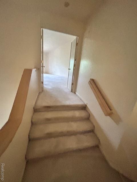 6880 Burtonwood Dr, West Bloomfield, MI 48322 - stairway with carpet floors