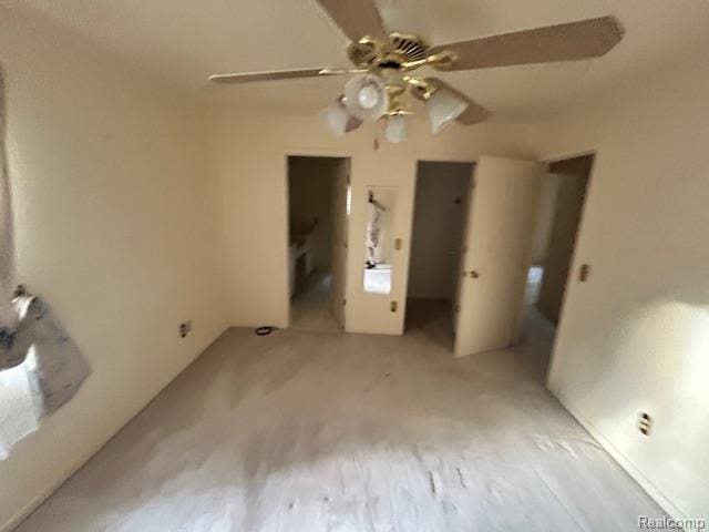 6880 Burtonwood Dr, West Bloomfield, MI 48322 - unfurnished bedroom featuring ceiling fan and wood finished floors